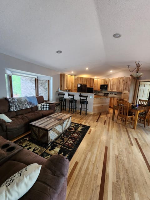 Updated living room photo now open to remodeled kitchen!