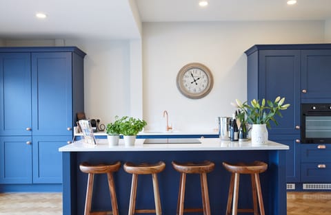 Main Kitchen with washer dryer, fridge freezer, microwave, oven and hob