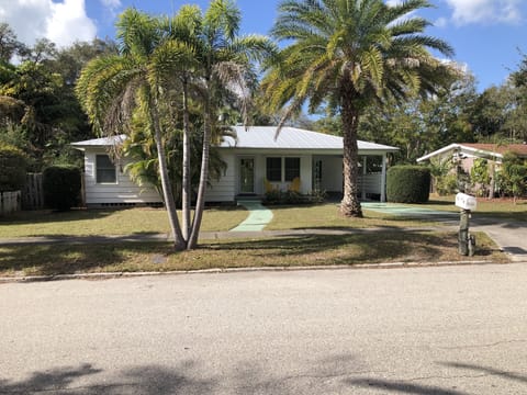 With carport and parking (2 cars total)