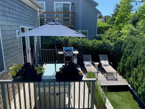 Private sun deck surrounded by lush planting