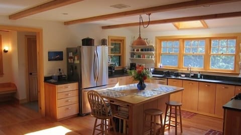 Bright and beautiful kitchen with granite countertops, stainless appliances 