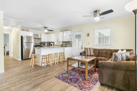 The kitchen overlooks the living room, perfect to entertaining during your stay.