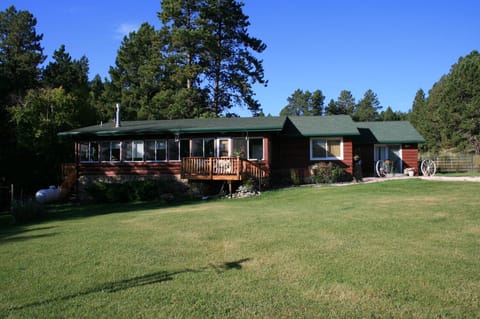 Cabin with front deck from yard @ Golden Valley Ranch