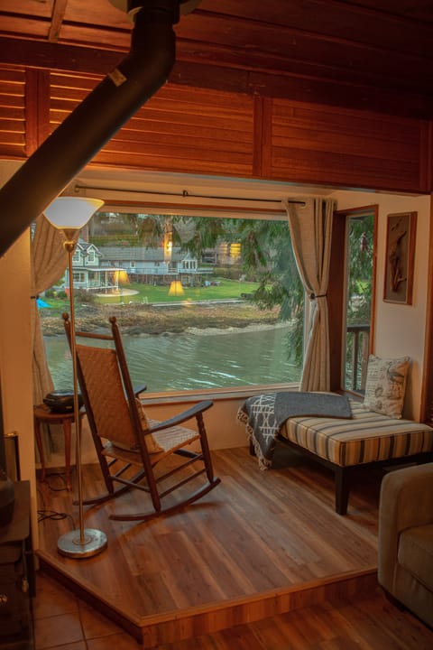 Living room nook overlooking cove (blackout curtains if using sofa sleeper).