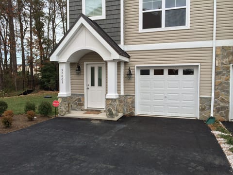 End Unit with plenty of parking compared to other units! Side-yard for the kids