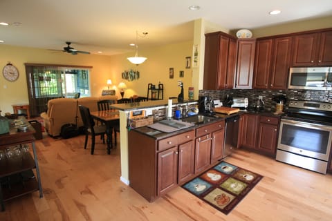 2nd Floor Open concept plan with large spacious kitchen, breakfast bar.