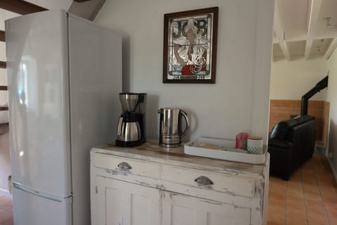 Coffee machine and kettle.