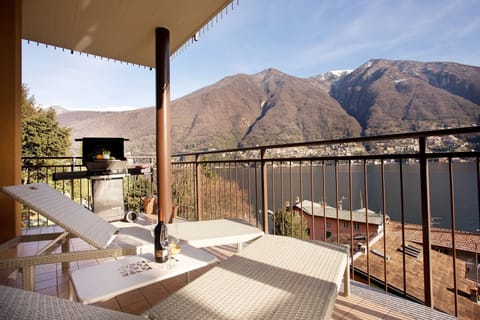 Put your feet up & take in the panoramic lake view