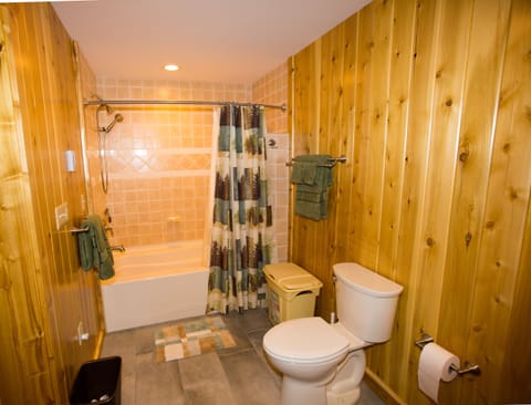 Master bath with tub, shower and heated tile floor