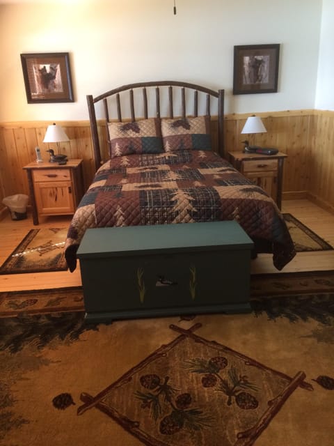 Master bedroom with full bath and great view of the lake.