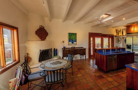 Breakfast Table,
Bar Counter behind kitchen sink, 2 stools.
(Chimney unavail)