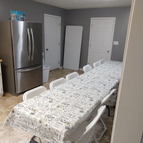 Large kitchen with stainless appliances