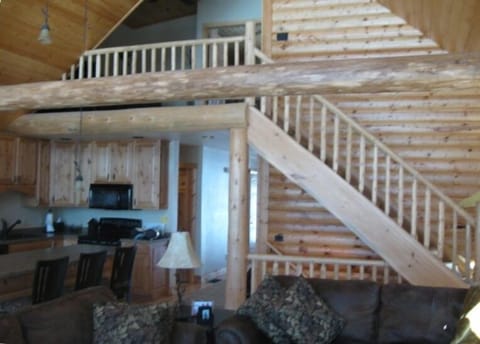 Log siding and railings make this Great Room warm and inviting.