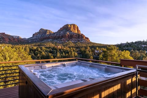 Achieve total relaxation in the Hot tub with an incredible view. 
