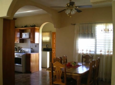 Kitchen, dining and laundry area