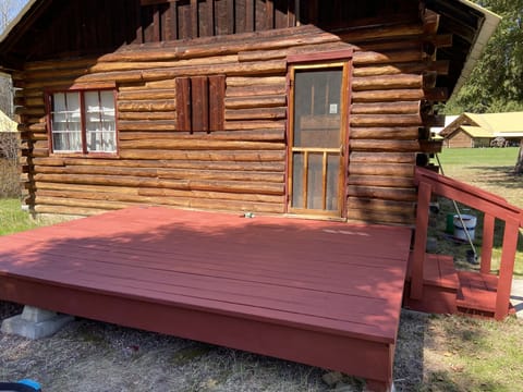 Front of cabin with deck. 