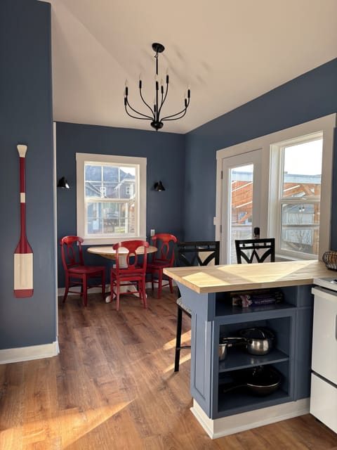 New Windows & Door In The New Kitchen. Outdoor Dining Just Through This Door.