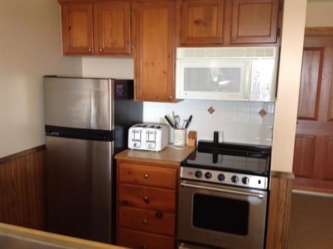 Kitchen area with new ceramic top stove