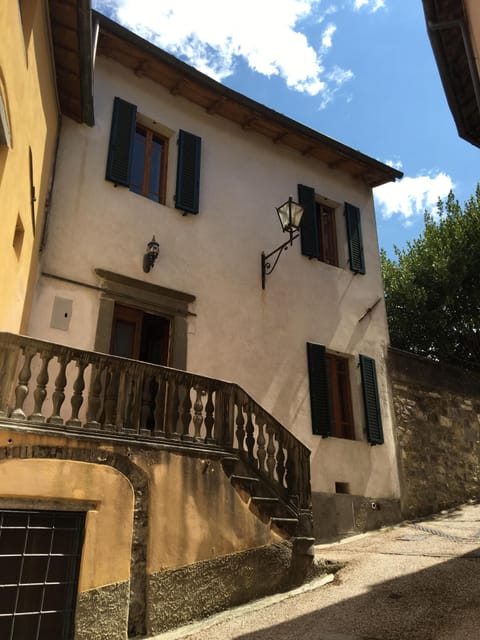 The front door of the house, accessed from within the walls of the old city.