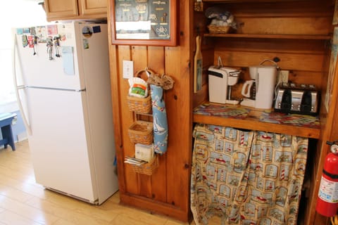 kitchen with many appliances cottage decor 