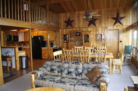 Adjacent kitchen/dining/living areas; door to master bedroom/bath