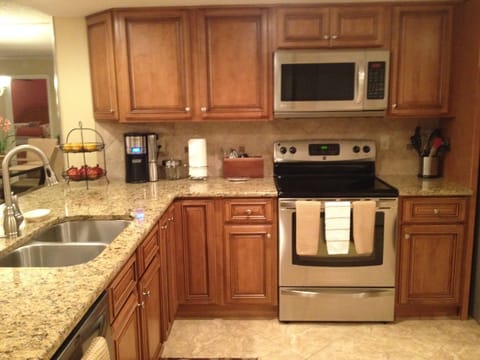 Kitchen with dishwasher and duel sink.