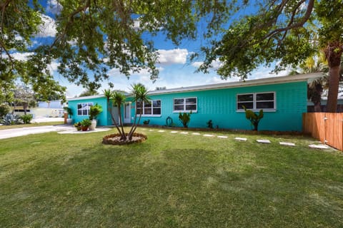 The studio is the left portion of the house with a private entrance and yard