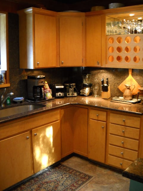 Kitchen in 16014 with granite counters and stainless appliance