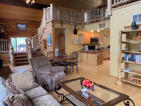 Lots of natural light fills this woodsy living space, making it feel like home