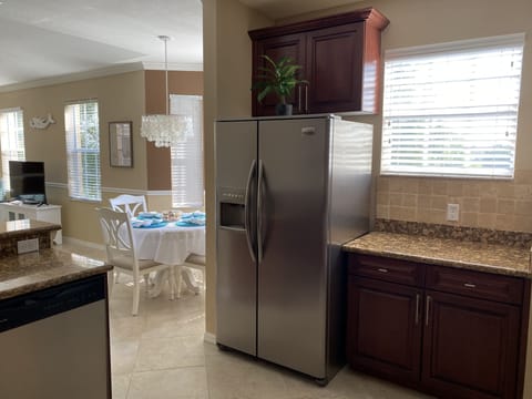 Open concept—Kitchen, dining area, overlooking living room 