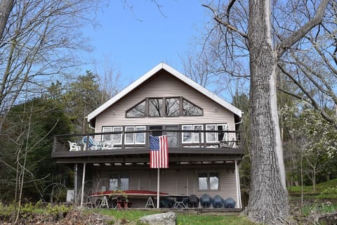 Lakeside view of house from the beach - main living level up, bedrooms down