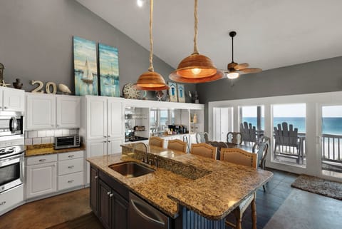 Large Granite Kitchen with Stainless steel appliances. 