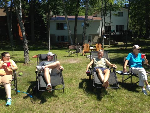Large grass outdoor area to lake.