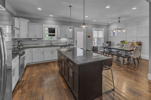 This kitchen provides the perfect setting for culinary creativity and family/friend gatherings.