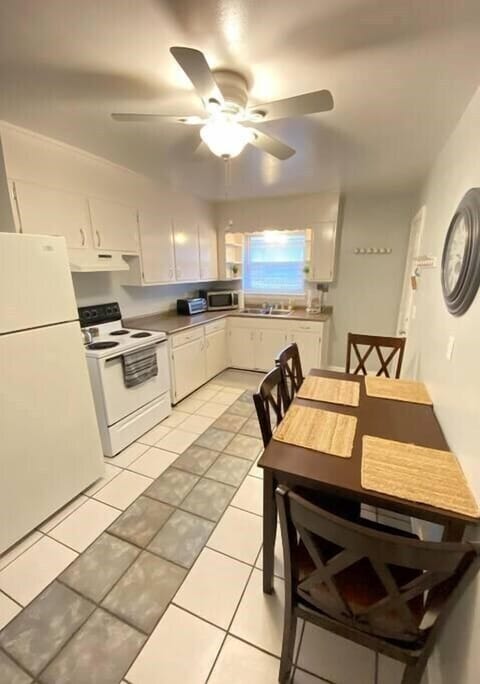 Prepare your favorite meals in our fully-stocked kitchen.