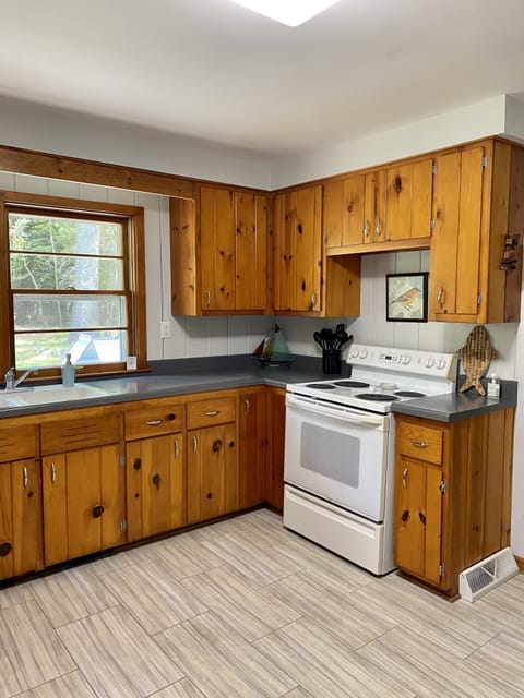 Electric stove and lots of cabinet space