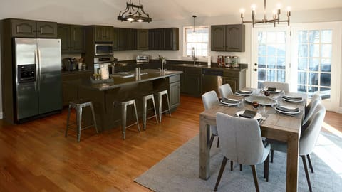 Large Fully Stocked Kitchen, Dining Room,  Gas Grill + Seating on Outdoor Deck 
