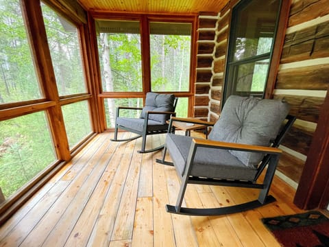 Other side of screened-in front porch. Also great for seeing the local wildlife.