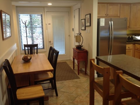 Table with seating for 6 (4 chairs and a bench)