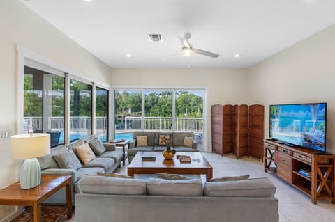 Enjoy laid-back comfort in this sunlit living room.