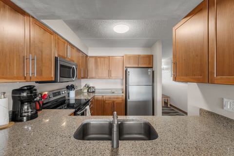 View of kitchen and serving counter from the dining area