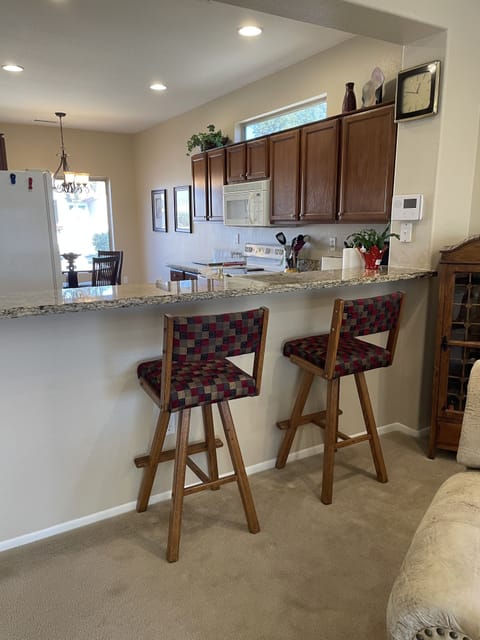 Seating at the bar or in the kitchen depending on your preference.