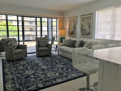 Enjoy all the comforts of this bright living room with queen sofa sleeper.