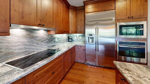 Stunning gourmet kitchen superbly equipped with spices, oils and essentials