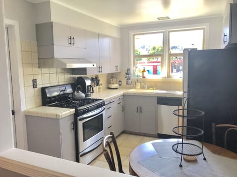Well appointed Kitchen with gas stove/oven + Cuisinart, coffee maker, microwave
