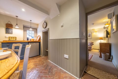 Ground floor: Dining area leading to sitting area