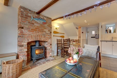 Ground floor: Cosy wood burning stove in the seating area