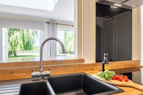 The kitchen looks out over the garden