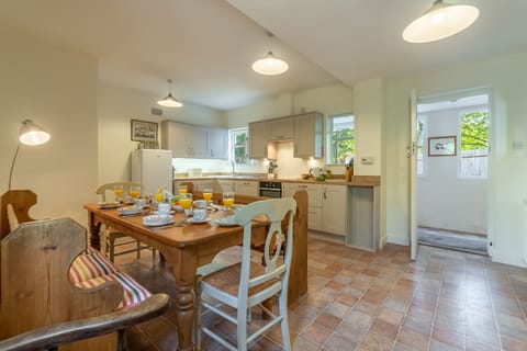 The Cove, Old Hunstanton: Dining table in the well-equipped kitchen