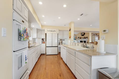 Open kitchen comes fully stocked to prepare and serve meals.